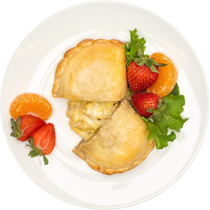 Image of the Country Breakfast 3oz Pocket product on a plate, with other assorted foods