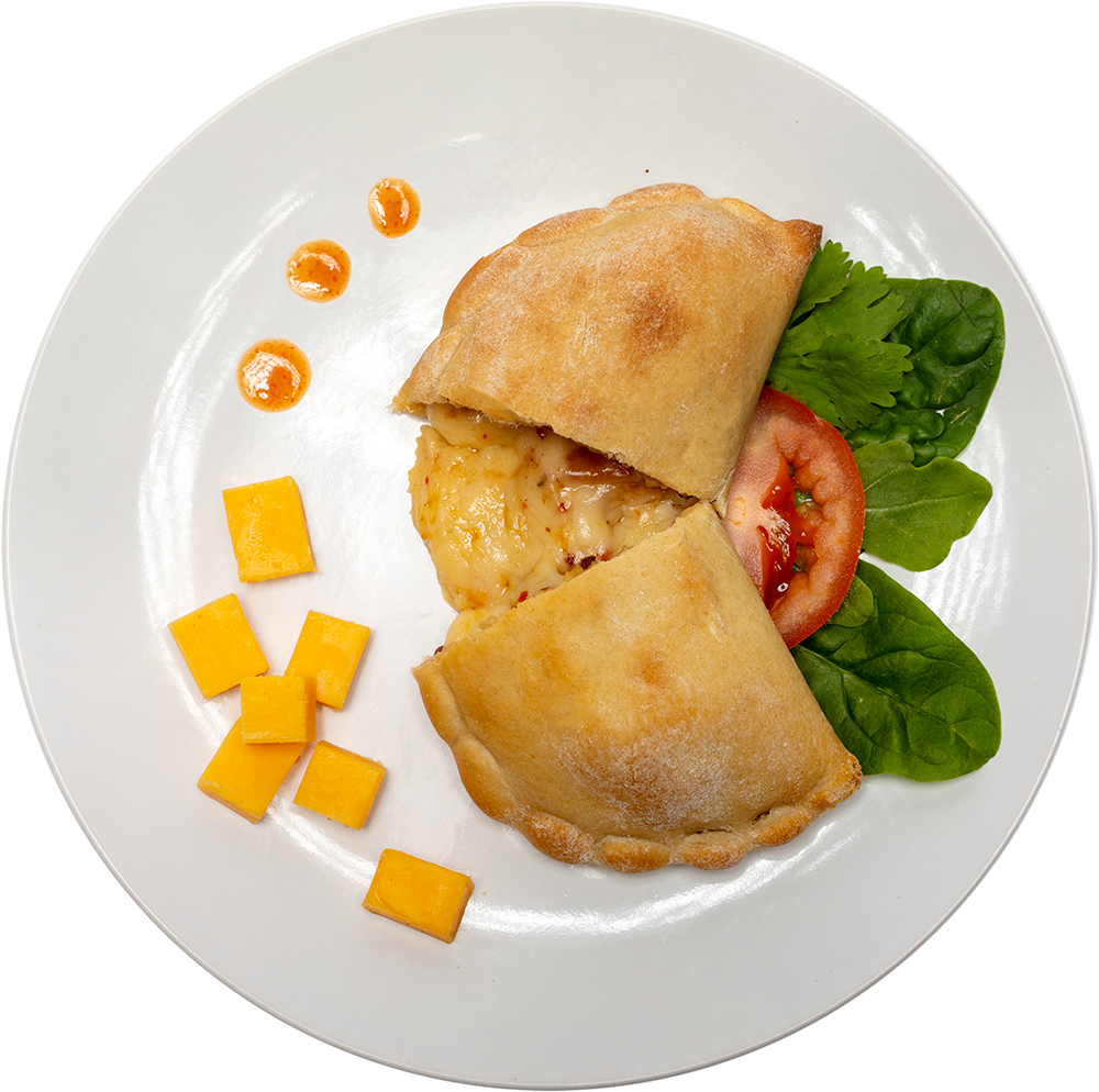 Image of the Spicy Cheesy Pocket product on a plate, with other assorted foods